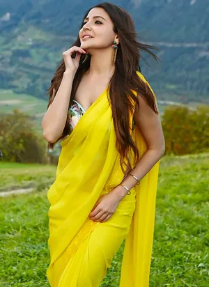 anushka hot navel in yellow saree