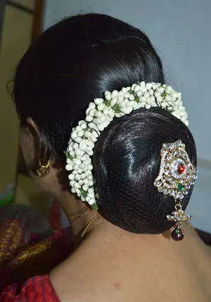Indian brides reception hairstyle by Vejetha for Swank Studio Braid up  do Bridal hair Saree Blouse Design H  Bridal hair buns Indian  hairstyles Hair videos